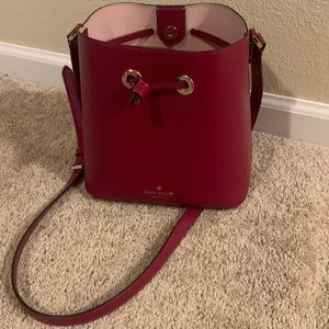 Slightly used Kate Spade bucket bag in burgundy